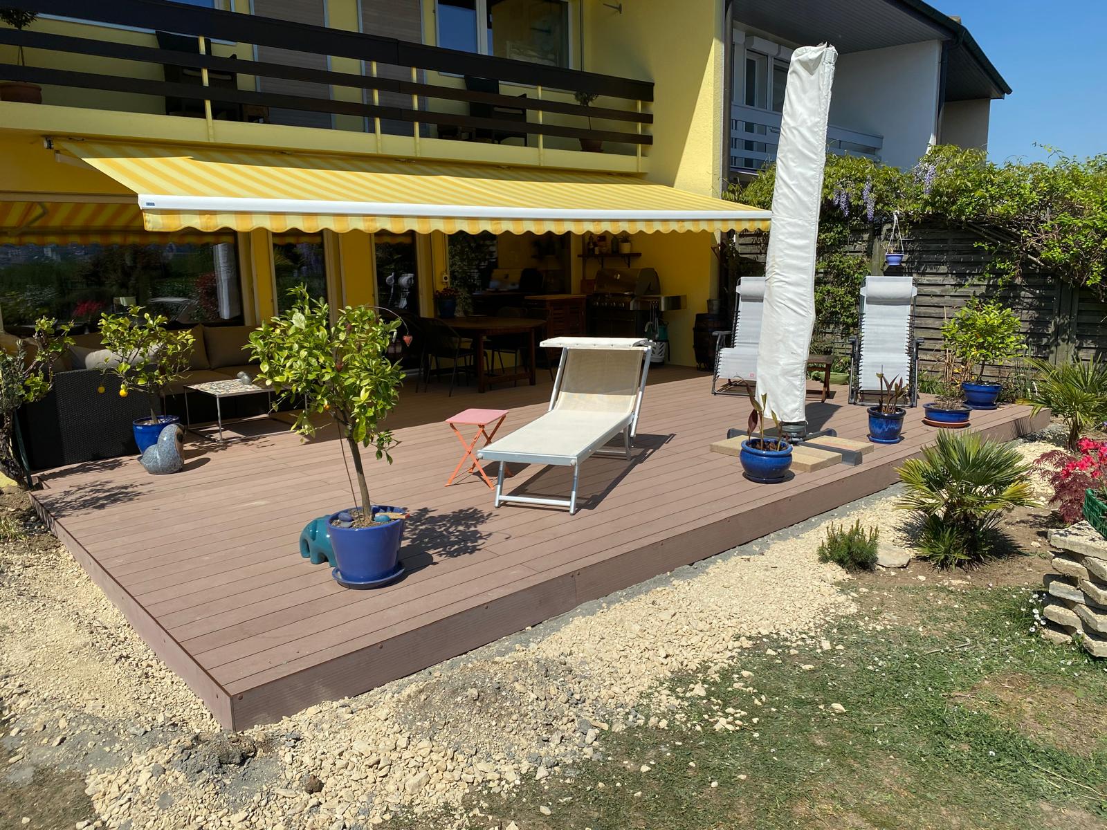 Terrasse composite Tarimatec sous store, sur terrassement complet